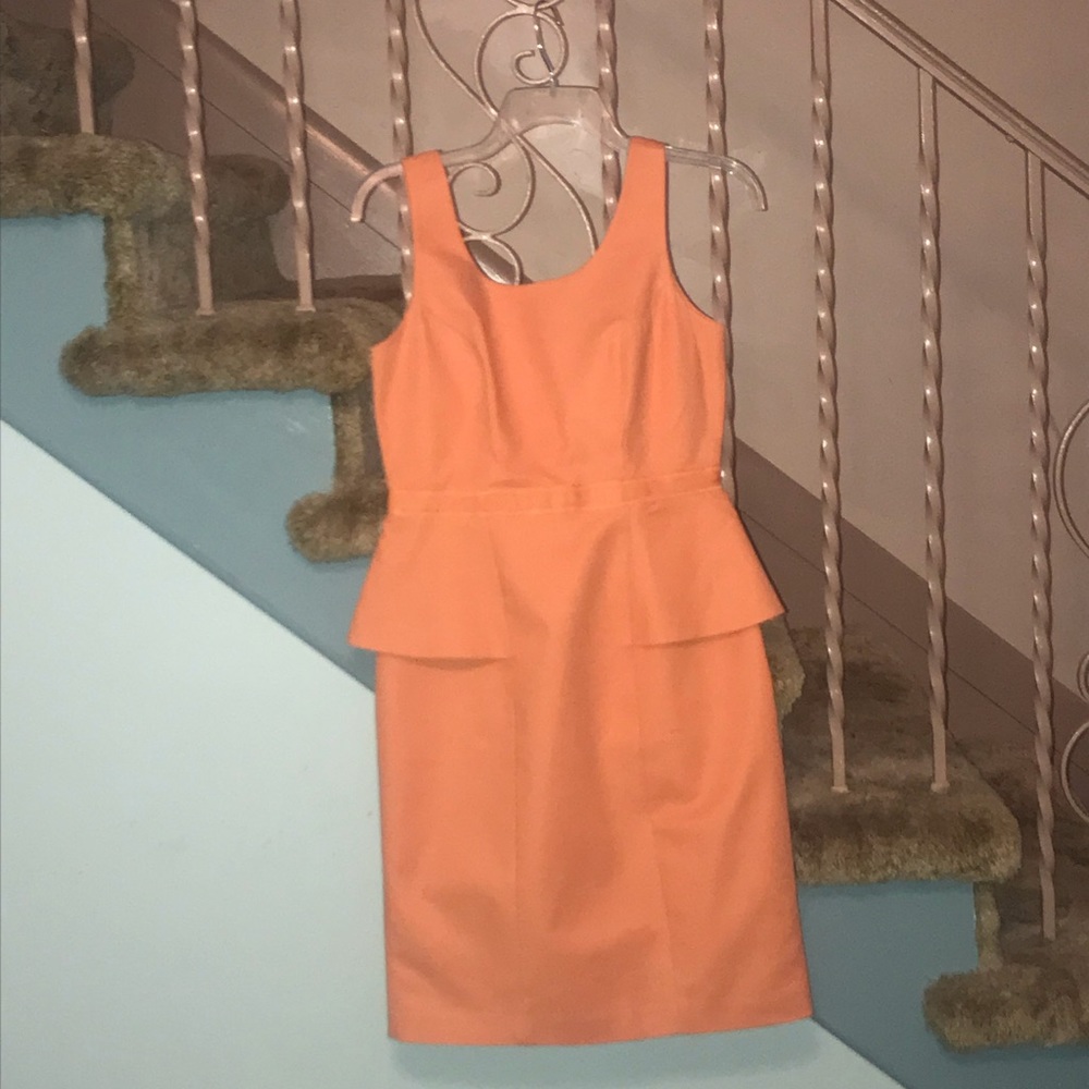 Orange peplum dress